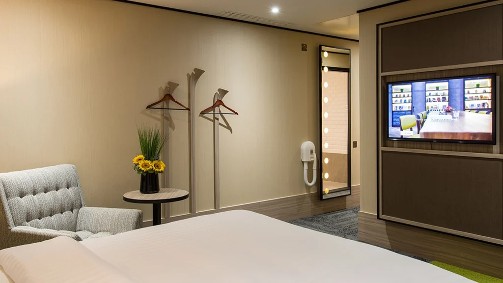 Aerotel London Heathrow room with TV and wardrobe area