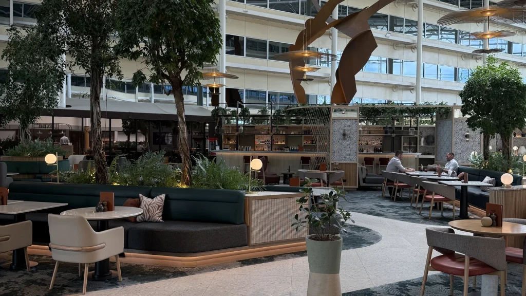 The glass-roofed atrium lounge at the Hilton Heathrow Terminal 4