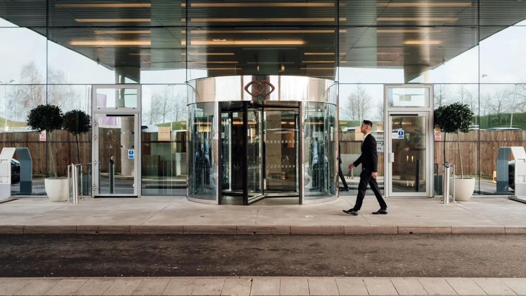 Sofitel London Heathrow hotel entrance with revolving door and doorman