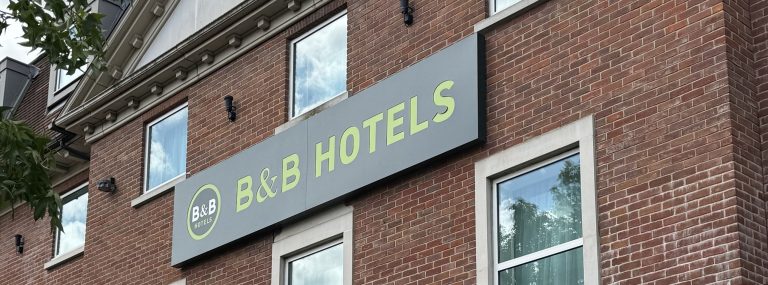 The B&B Hotels sign on the front of the B&B Hotel Heathrow in Colnbrook