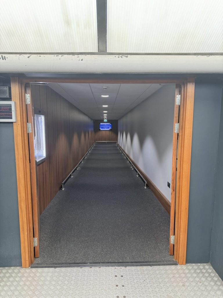 The covered walkway connecting the Crowne Plaza Heathrow Terminal 4 to Terminal 4