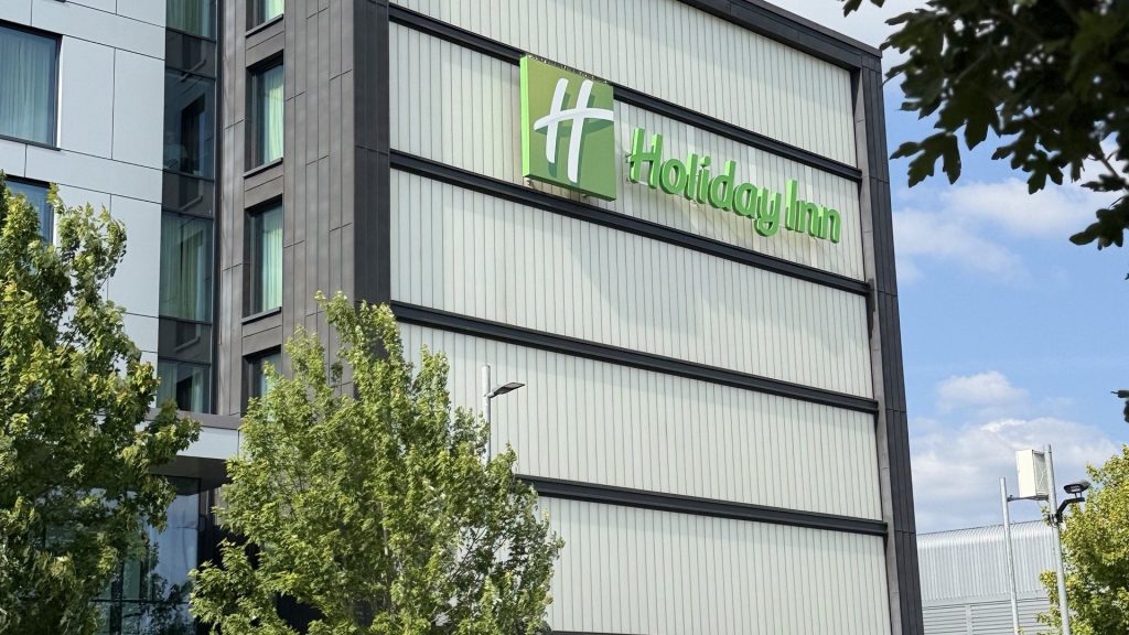 The Holiday Inn sign on the side of the hotel, seen from Bath Road