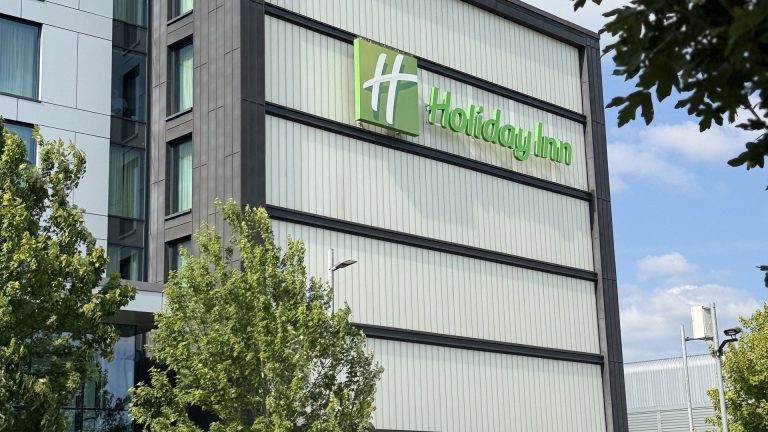 The Holiday Inn sign on the side of the hotel, seen from Bath Road