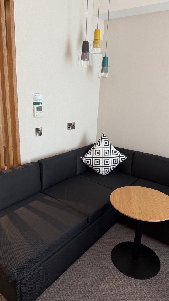 A seating area in the lobby with a low table