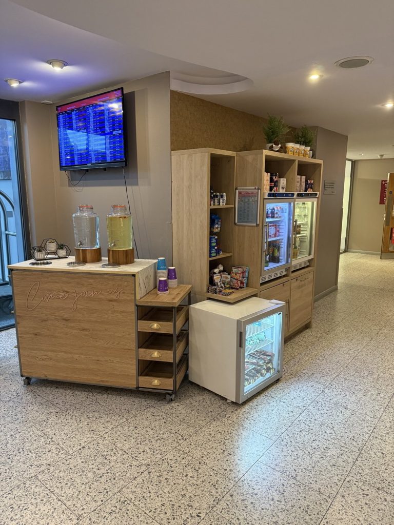 The grab and go area, with chilled cabinets and a coffee machine