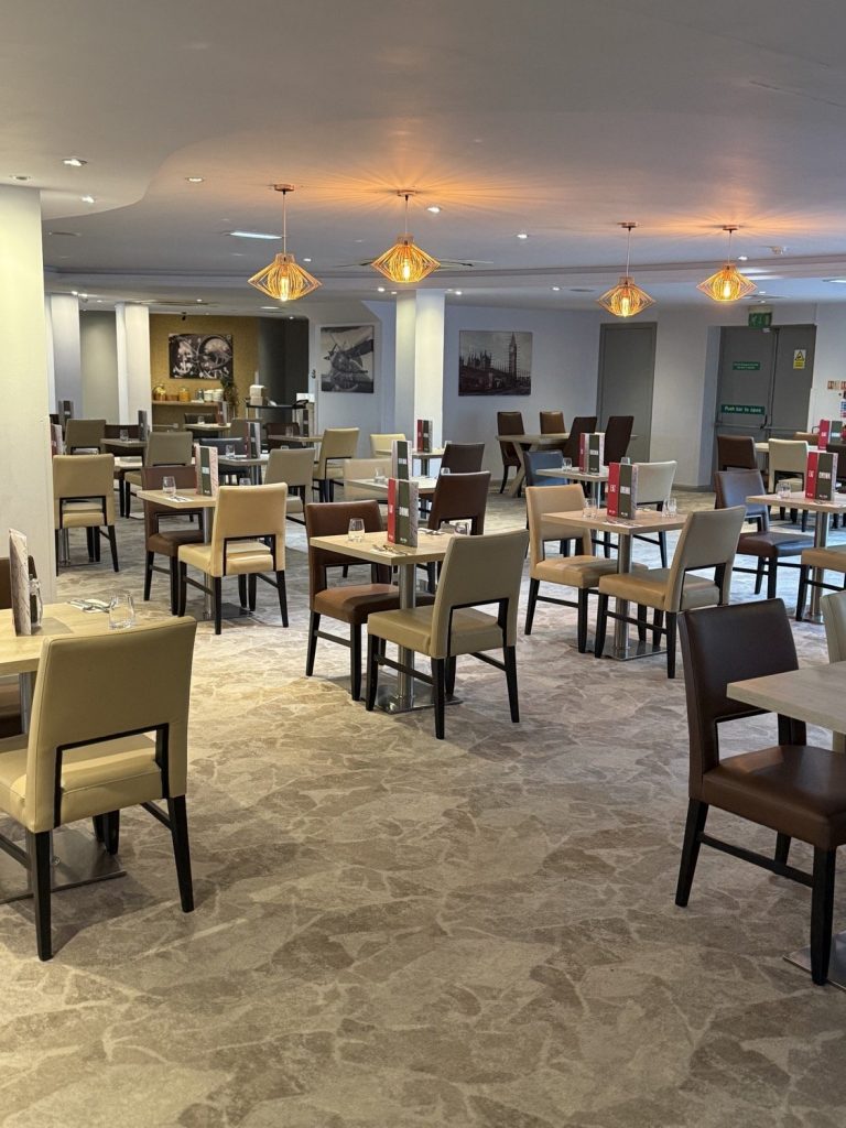 The restaurant, laid up with tables and chairs