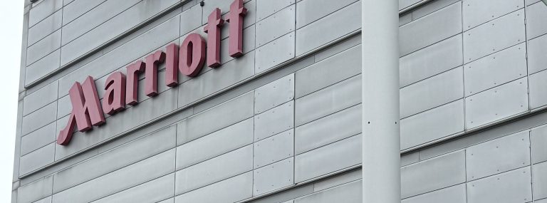 The Marriott sign and logo on the cladding of the Heathrow Marriott Hotel on Bath Road
