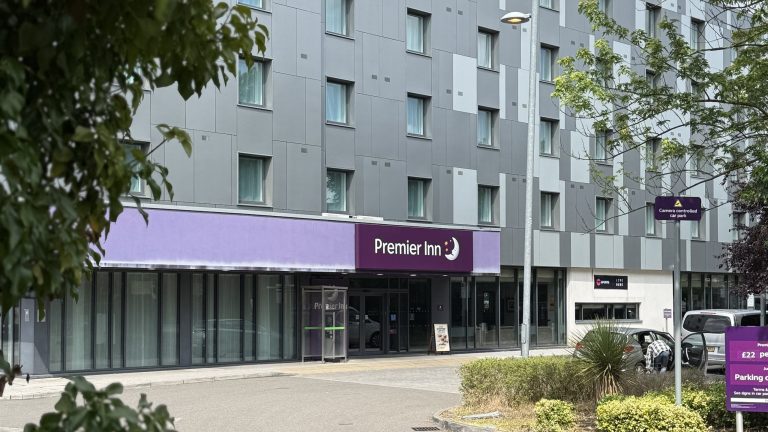 Premier Inn London Heathrow T5 from the car park, with the purple sign above the entrance