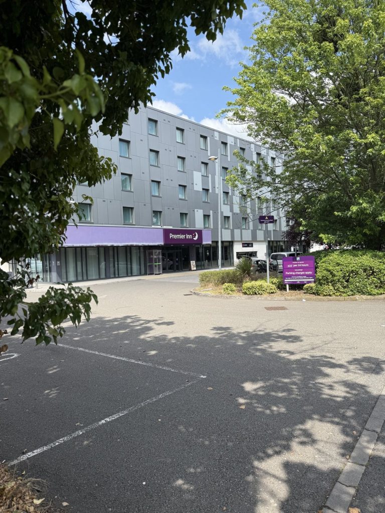 The frontage and entrance of the Premier Inn, seen from the approach road