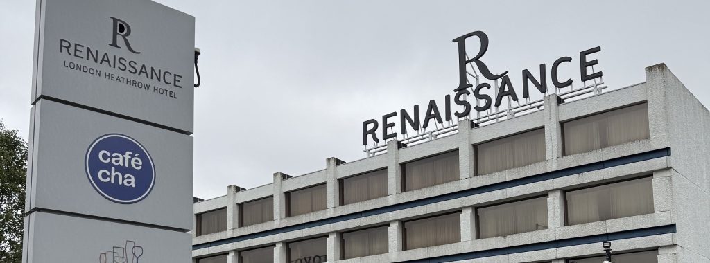 The Renaissance Heathrow on Bath Road, with the hotel sign on the roof and the totem sign at the entrance