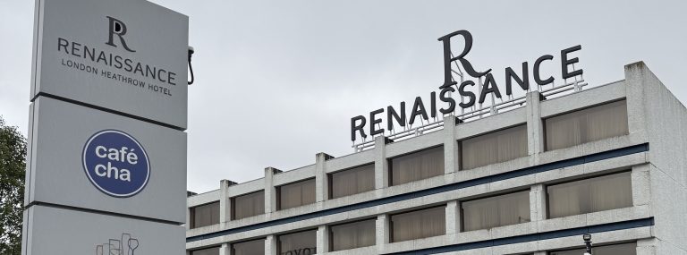The Renaissance Heathrow on Bath Road, with the hotel sign on the roof and the totem sign at the entrance