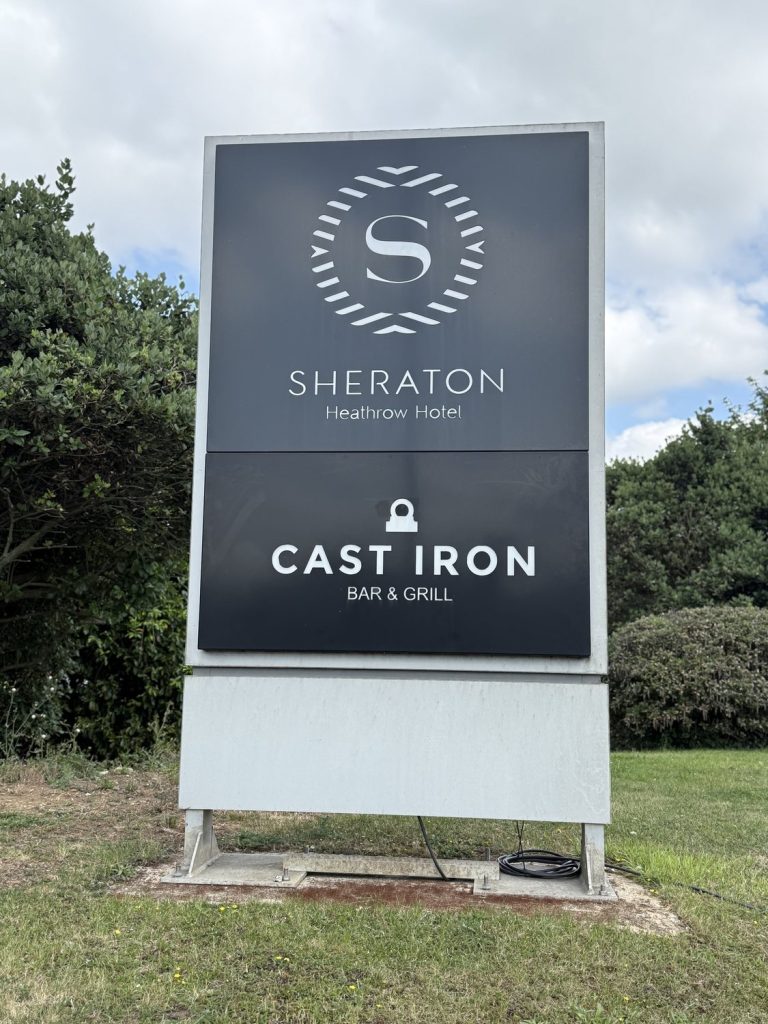 The Sheraton sign at the entrance, naming the Cast Iron Bar and Grill