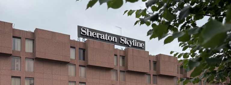 The Sheraton Skyline rooftop sign on the front of the Sheraton Skyline Heathrow on Bath Road