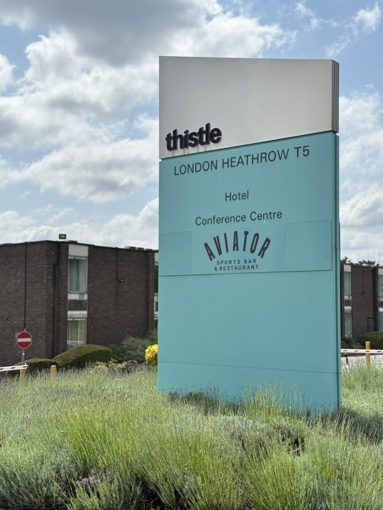 The Thistle sign reading London Heathrow T5, Hotel, Conference Centre and Aviator Sports Bar and Restaurant